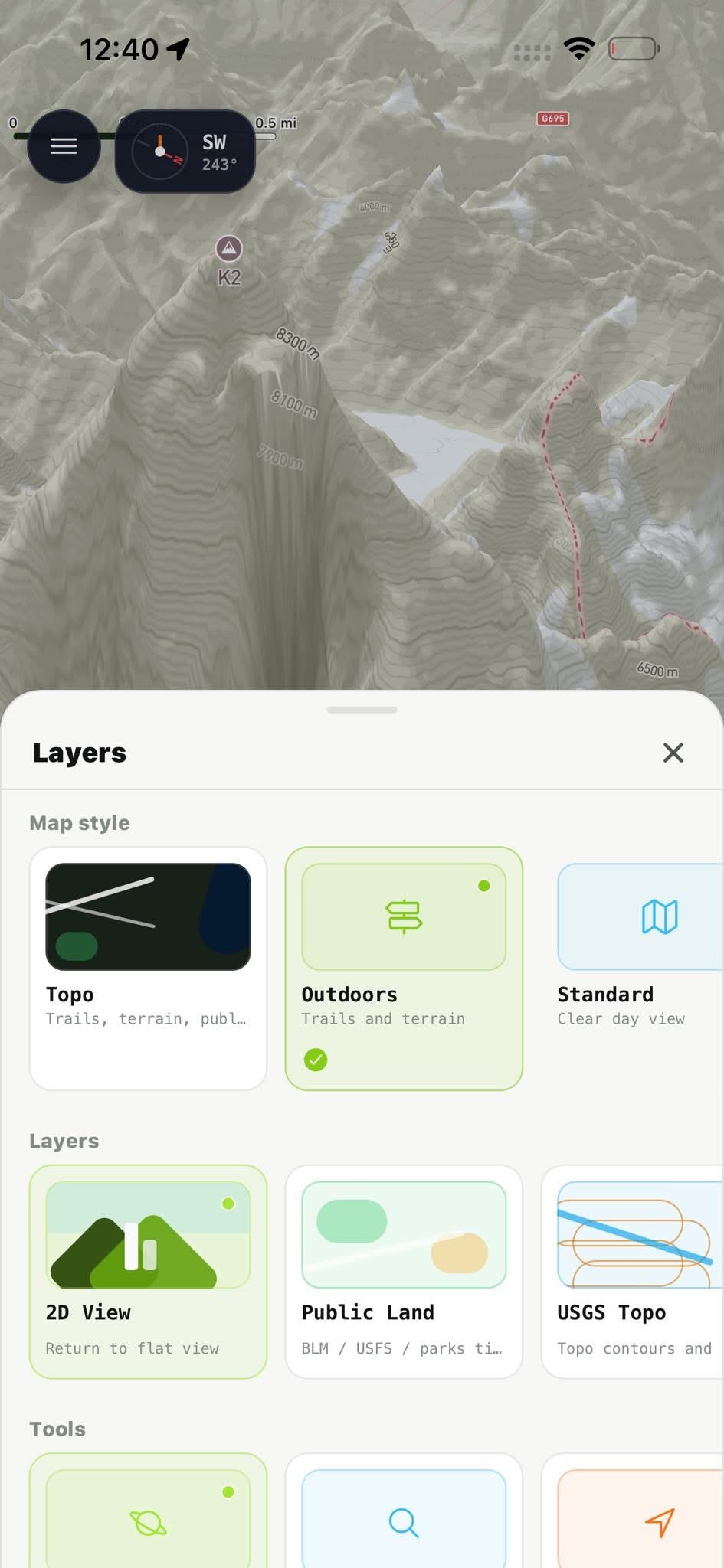 Trailhead layers sheet over K2 terrain